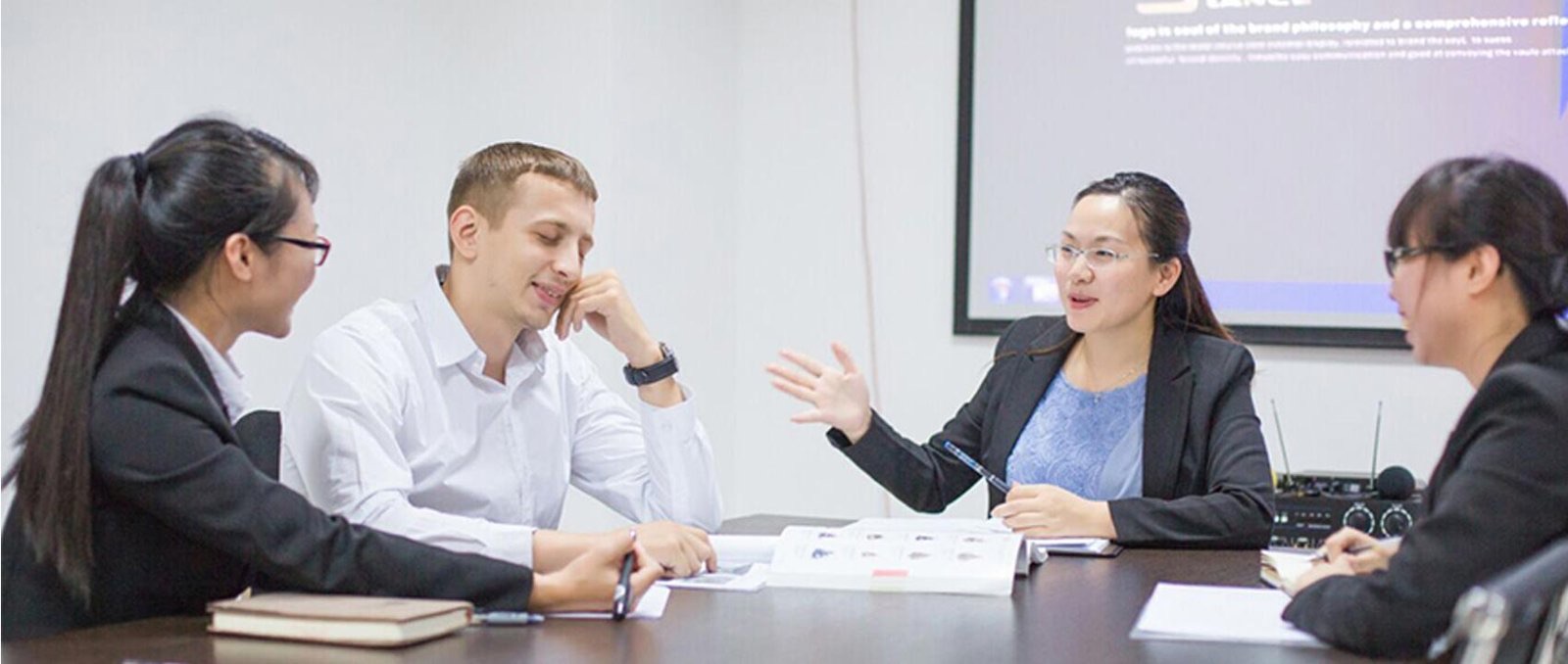 Lance team talking a buyer through product options in the Yiwu office